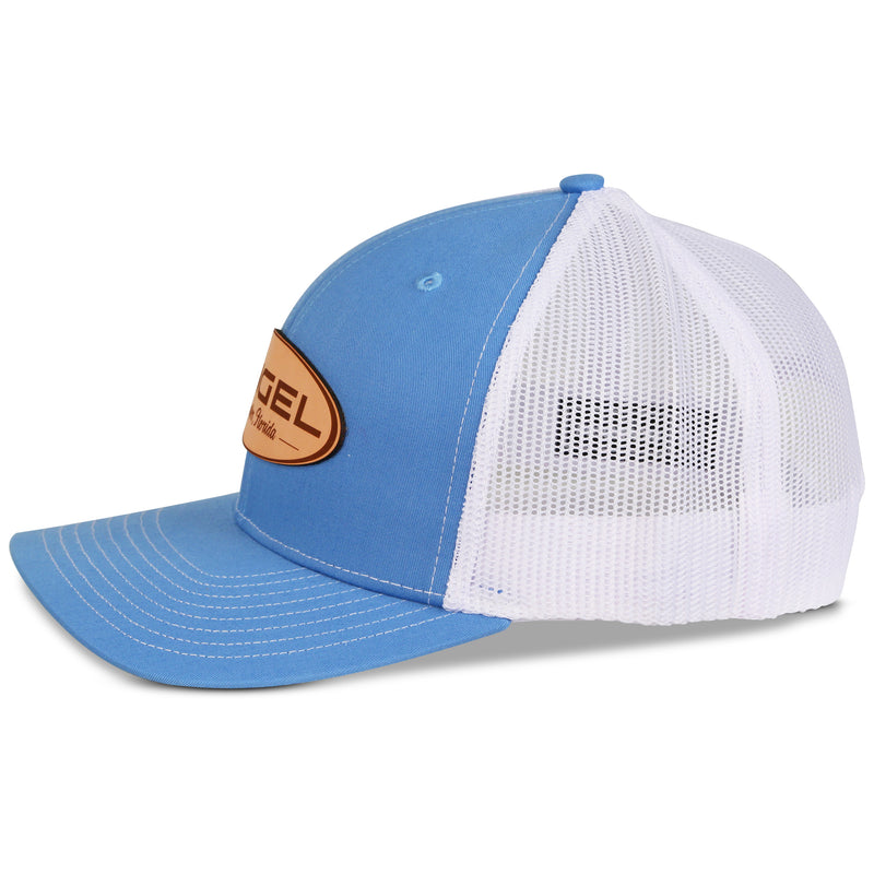 A blue and white Engel Columbia Blue & White 112 Trucker Cap with a breathable mesh and an Engel Leather Patch by Richardson®.