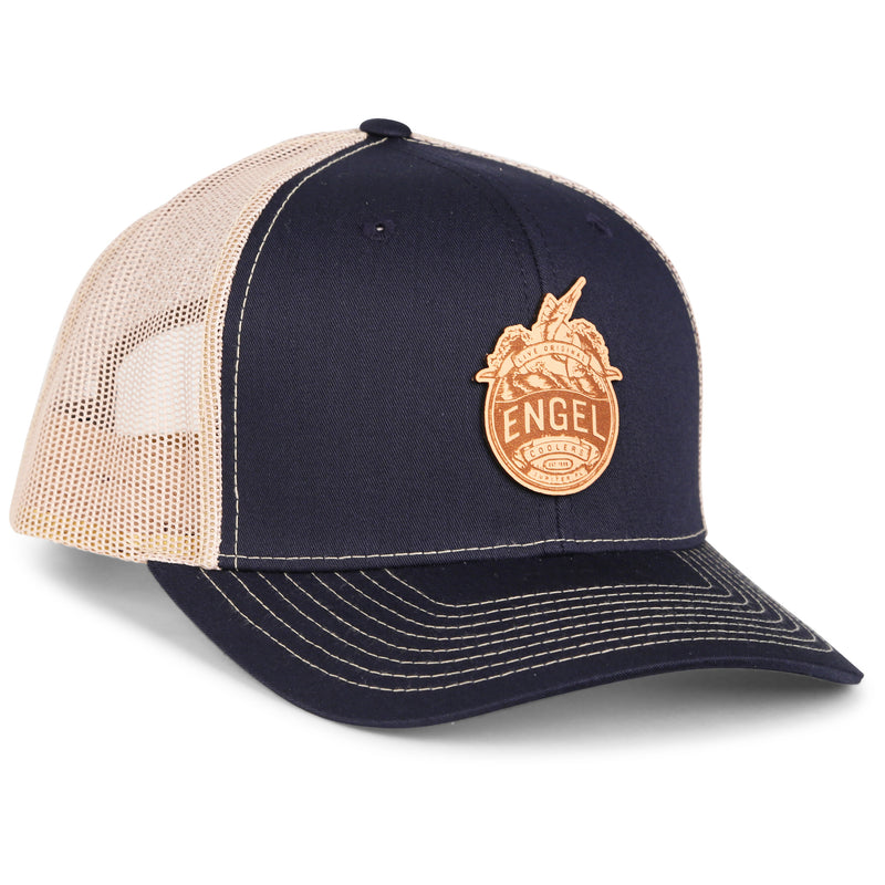 A navy and tan Engel Columbia Navy & Khaki 112 Trucker Cap by Richardson® with the word eagle on it and a snapback closure.