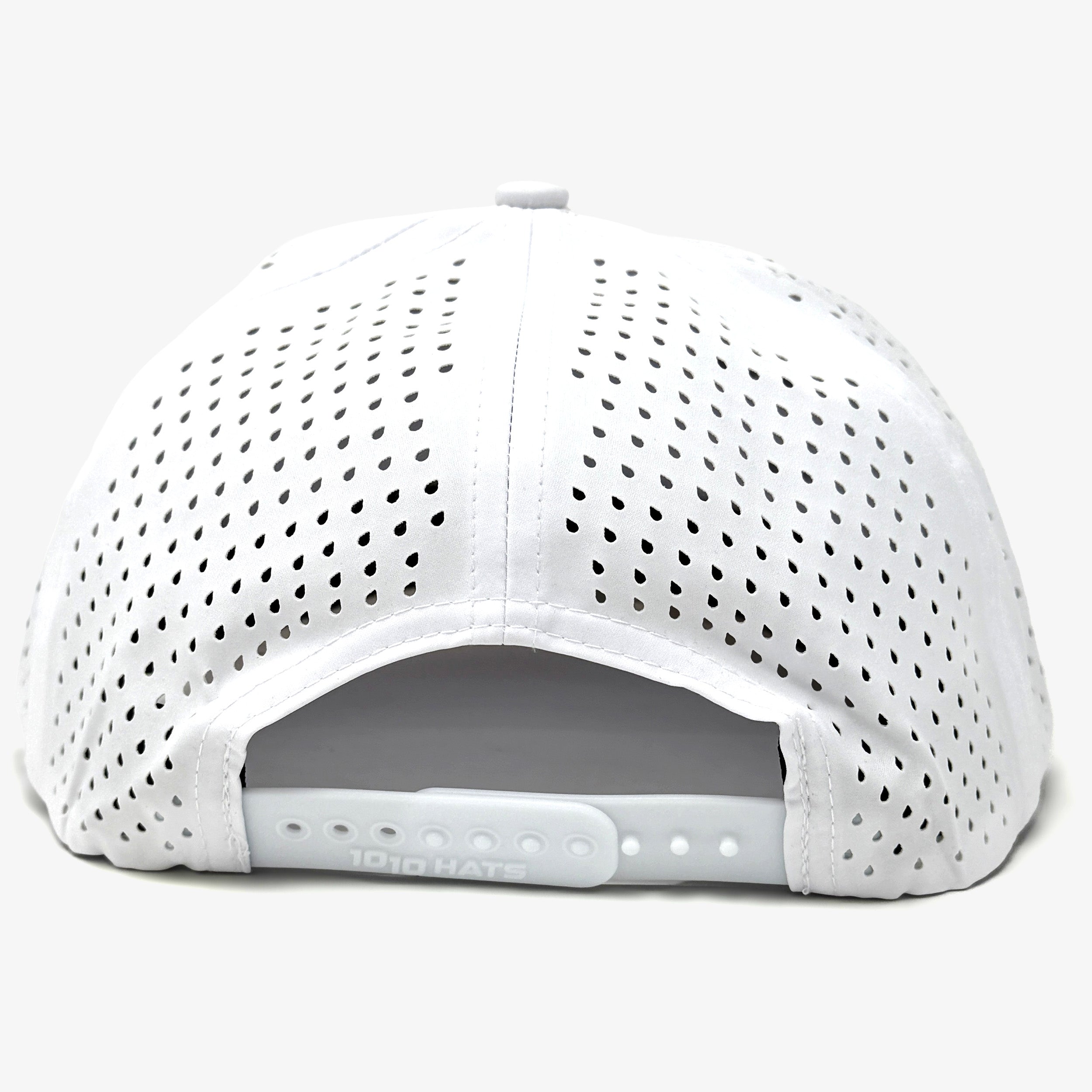 The Engel Coolers 1010 Performance Trucker Cap by Engel Coolers features a white perforated mesh back and an adjustable plastic snap closure, offering breathable comfort as part of the Performance Caps collection.