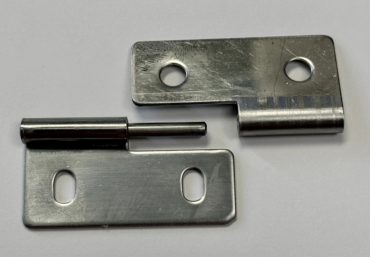 Two metallic hinge pieces with rectangular plates and holes, one with a cylindrical pin, are shown on a plain white surface as the Engel Coolers MT35/45 Hinge Assembly – Removable Lid replacement.