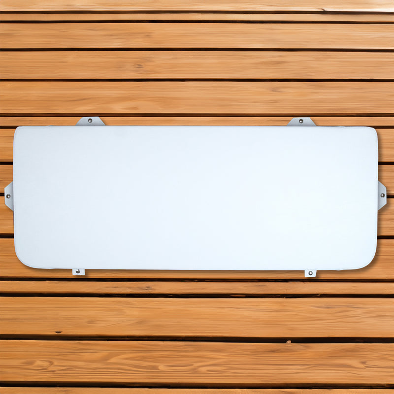A white seat cushion for Engel Hard Cooler hanging on a marine-grade wooden wall.