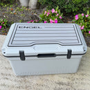 A grey plastic box with Engel Coolers UL60 SeaDek® Non-Slip Marine Cooler Topper and black handles.