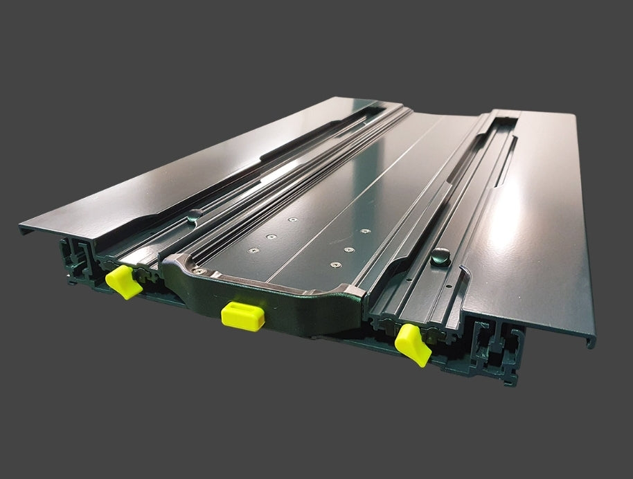 A black tray with yellow handles on it, featuring an ENGEL Standard Low-Profile Front Pull Fridge Slide with No-Tie Design.