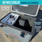 An open Engel Coolers 13 Quart Drybox/Cooler doubling as a leak-proof air-tight container, filled with electronic gadgets and dry bags, with features listed on blue labels.