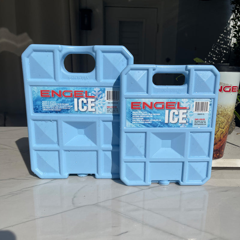 Two blue, non-toxic Engel Coolers Cooler Packs on a table.