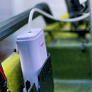 A rechargeable lithium-ion Engel Coolers Live Bait Aerator Pump is attached to the back of a boat.