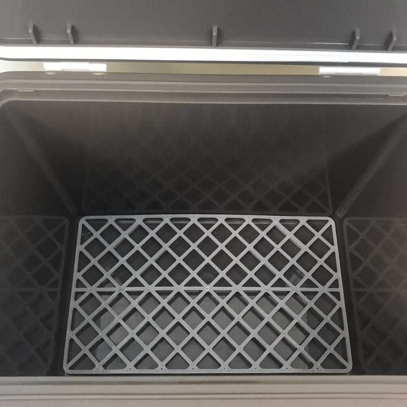 A black Engel Coolers UC19 Drybox cooler with a Drybox Cooler Grate on the bottom.