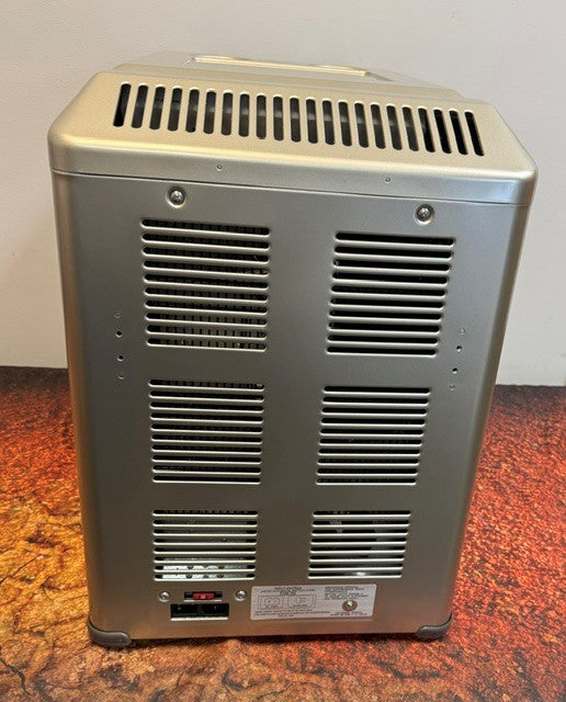 Back view of the Engel Coolers Engel MT45 Platinum Series portable fridge-freezer, showcasing multiple ventilation slots, a power switch, a power socket, and an information label on its textured surface. This model features the efficient Swing Motor Compressor for reliable cooling performance.