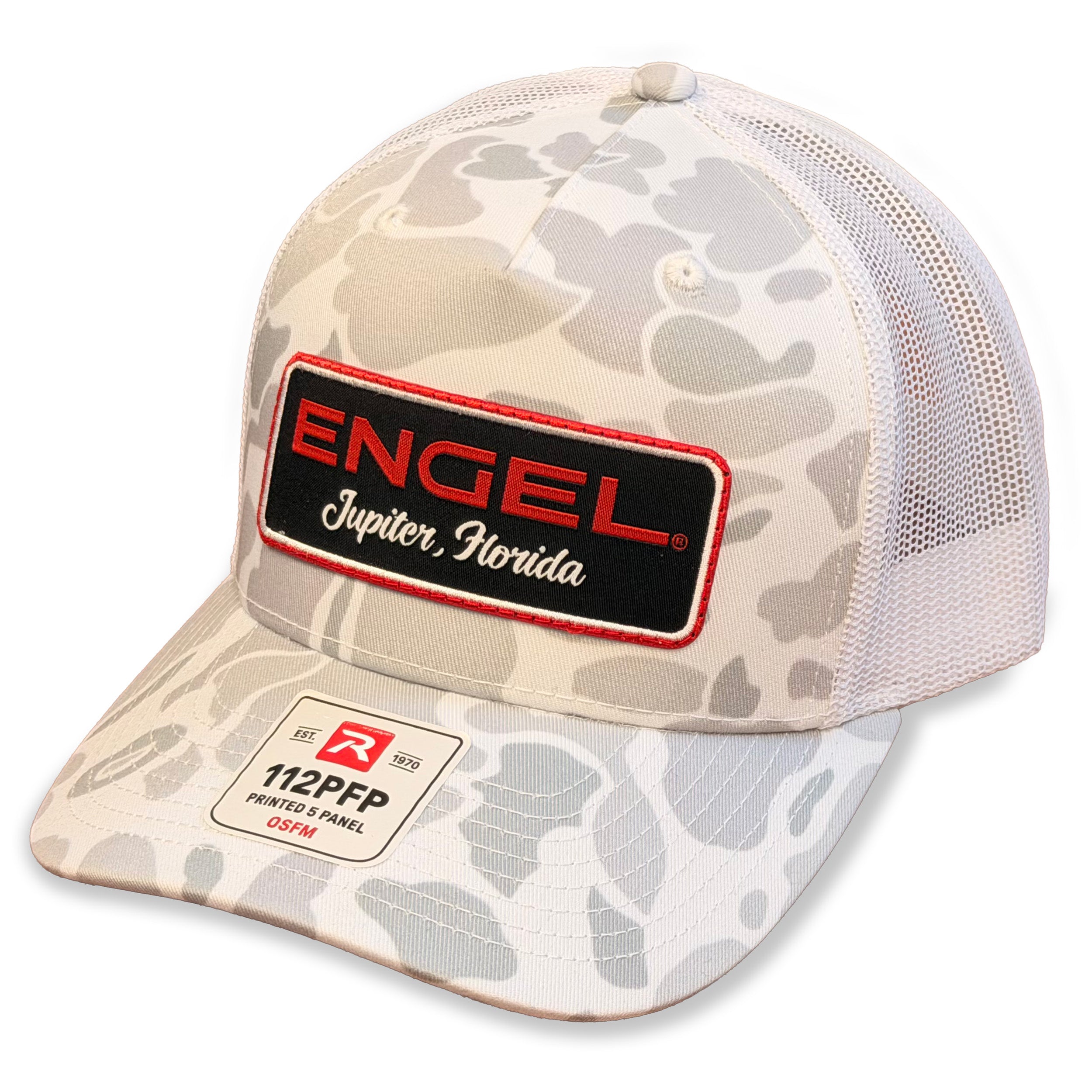 The Engel Blizzard Duck Camo Camo with Engel Patch Richardson® 112 Trucker Cap features a light camo-pattern mesh design, showcasing a black and red Engel patch with "ENGEL Jupiter, Florida" on the front, along with a white "112PFP PRINTED 5 PANEL OSFM" label on the bill. This cap is styled after the classic Richardson 112 Trucker Cap and includes a convenient snapback closure for an adjustable fit.