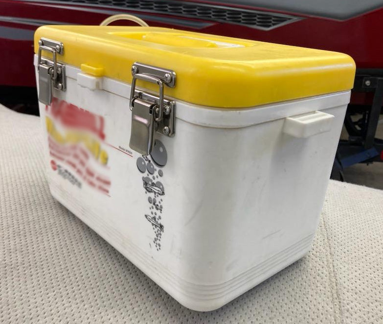 A stainless steel Engel Coolers Drybox Latch sitting on top of a boat.