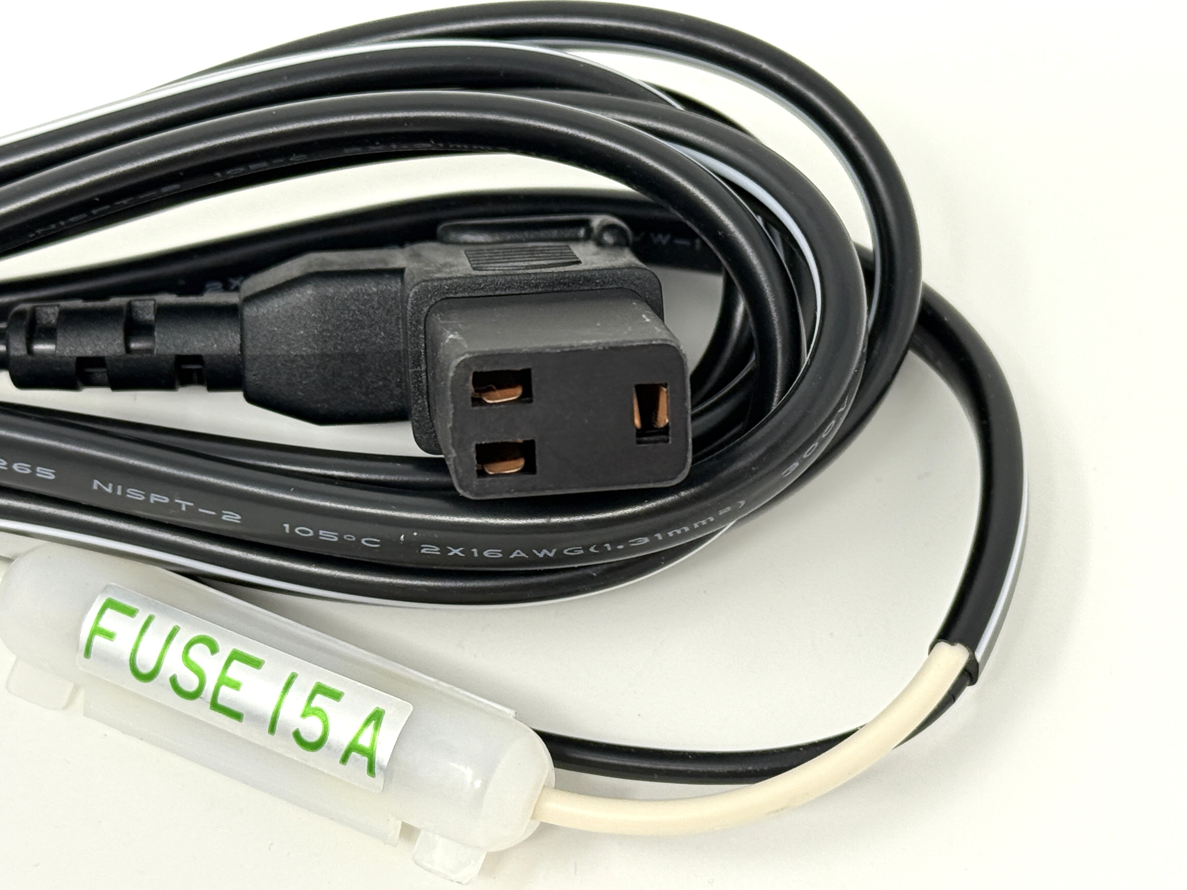 Close-up of the Engel Coolers DC Hardwire Kit power cord with a three-prong connector and an in-line fuse holder labeled "FUSE 15A," designed as a DC system replacement part, shown on a white background.