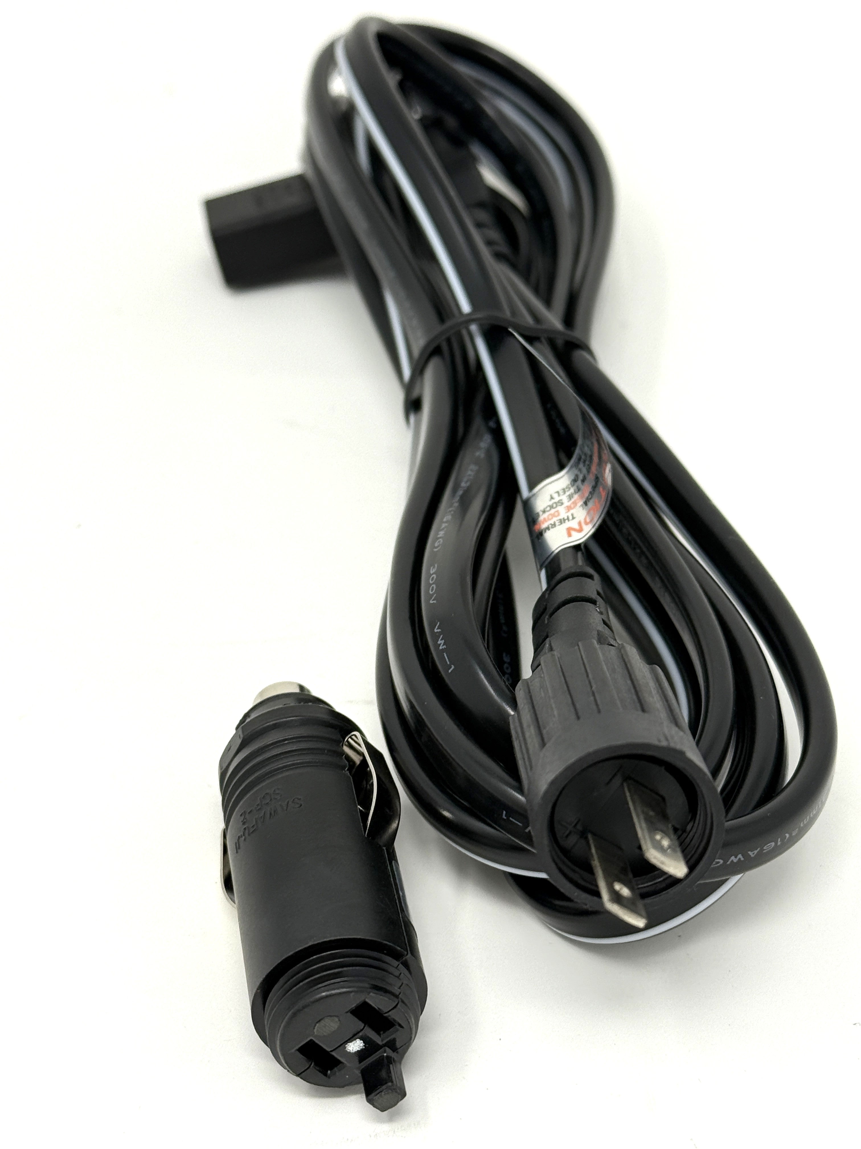 The Engel Coolers DC Power Cord for Engel Fridge-Freezer features a black, coiled cable with a two-prong household plug and a car cigarette lighter adapter—perfect as a replacement for your Engel fridge-freezer.