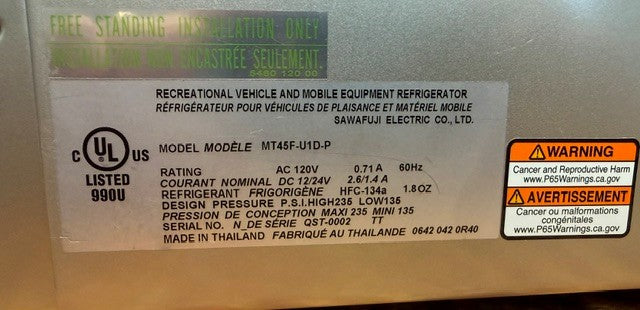 Close-up of a refrigerator information label showing the model MT45F-U1D-P from the Engel Coolers MT45 Platinum Series, highlighting technical specifications such as the Swing Motor Compressor, safety warnings, and manufacturer information.