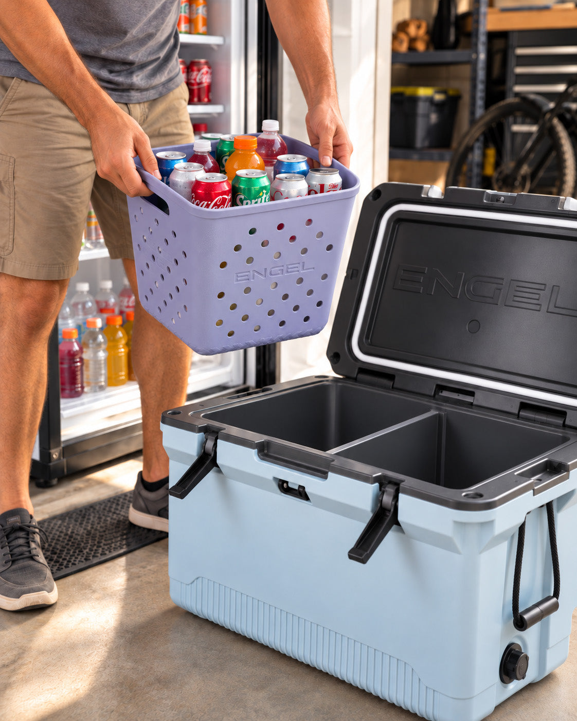 Person placing a lavender perforated foam Engel Cooler Loader | Lightweight EVA Foam Cooler Caddy, 11″ x 11″ x 11″ filled with canned drinks into an open light blue Engel cooler.