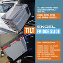 Portable ENGEL fridge secured on a Engel Low-Profile Front-Pull Tilt Fridge Slide in a vehicle for convenient access.