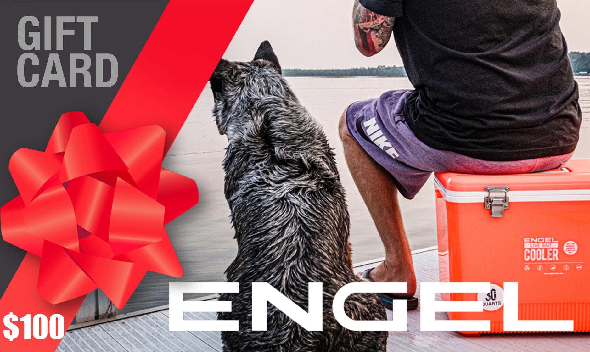 A person sitting on a dock with a $100 Engel Coolers Gift Card next to them, turned away and accompanied by their dog. The substantial gift card, decorated with a red bow in the corner, offers the ultimate gift of choice.